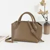 Bolsa tote minimalista transfronteiriça para mulheres, novo modelo 2026, bolsa de mão vintage estilo old money, bolsa transversal versátil para o dia a dia