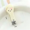 Cortauñas de dibujos animados lindos con tapa protectora, cortauñas anti-salpicaduras, recortador de uñas portátil