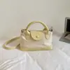Bolsas de Mão de Nicho para Mulheres 2026 Nova Tendência Primavera/Verão Popular Super Quente Exquisite para Trabalho Deslocamento Bolsa de Ombro Único Transversal