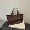 Bolso de Hombro Grande de Capacidad Simple Estilo Coreano Nicho Bolso Tote de Alto Valor Nuevo Primavera 2026 Bolso de Axila para Viajar