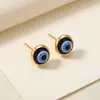 Pendientes de Diseño de Lujo Ligero Europeo y Americano Estilo Gótico Temperamento de Moda Pendientes de Presión Pequeños en Espiral Ojo del Diablo Goteo de Aceite Transfronterizos