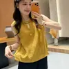 Camisa sin mangas de cuello alto estilo chino de venta caliente para mujer 26 Verano Nuevo Holgado Adelgazante Versátil Moda Top estilo chino