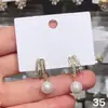 Aretes de Perla de Zirconia Aretes Únicos Estilo Nuevo Diseño de Personalidad de Nicho Aretes de Botón de Temperamento de Diosa Suave Colgantes