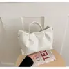 Bolso de cubo tejido de nicho transfronterizo 2026 nuevo bolso de cesta de moda para mujer bolso de mano simple para hombro cruzado