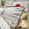 Set de cuatro piezas de gasa de doble capa tipo puff seguro para bebés Clase A, funda de edredón de gasa arrugada fresca y linda, juego de tres piezas de dibujos animados para dormitorio de estudiante