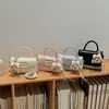 Bolsa Pequena Estilo Coreano com Textura de Jacaré Feminina 2026 Nova Tendência Moda Bolsa Quadrada Pequena de Mão Bolsa Transversal de Alta Qualidade para o Dia a Dia Verão