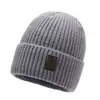Gorro de punto liso para otoño e invierno para hombres y mujeres, gorro de lana grueso y cálido, gorro versátil con borde enrollado, gorro de punto para exteriores