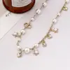 Colar com Pingente de Estrela e Franja Xiaoxiang Estilo Novo com Diamantes e Pérolas, Corrente Popular para Clavícula Feminina, Colar de Suéter de Luxo Leve com Letra