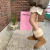 Pantalones cortos de invierno de lana de cordero de alta gama para mujer de Dongdaemun, Corea