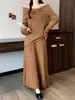 Conjunto de Suéter Estilo Francés para Mujer 2026 Primavera Nuevo Estilo Conjunto de Dos Piezas de Punto con Lazo en un Hombro y Falda