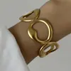 Pulseras Nuevas Transfronterizas Europeas y Americanas Acero Inoxidable Versátil Moda Oro Irregular Hueco Versión Ancha Joyería para Mujer