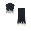 Atacado transfronteiriço 2026 Moda europeia e americana cor blocada renda retalhos top curto + conjunto de saia para mulheres D226546/47
