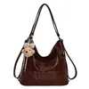 Bolsa feminina de grande capacidade 2026 novo modelo mochila para trabalho bolsa de ombro transversal tote bag grande capacidade