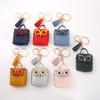 Mini bolso creativo de cuero con forma de búho, bonito bolso para auriculares Bluetooth, bolso de almacenamiento, llavero, bolso colgante