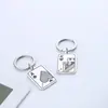 Cartas de poker preto Pêssego um par chaveiro criativo simples aço inoxidável metal anel de chaveiro mochila pingente acessórios