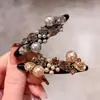 Pinzas para el cabello de pico de pato de alta gama estilo coreano con incrustaciones de perlas y diamantes para mujer, con un diseño lujoso para flequillos laterales y peinados en la parte posterior de la cabeza, un nuevo accesorio para el cabello para mujer
