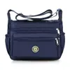 Bolsa Transversal de Tecido Oxford Estilo Novo 2026 para Mulheres, Bolsa para Mãe de Meia-Idade e Idosa, Bolsa de Ombro Floral Fashion, Bolsa de Armazenamento Multicamadas