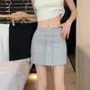 Falda corta deportiva casual anti-exposición para mujer, nuevo estilo verano 2026, falda ajustada a la cadera, media falda de línea A de cintura alta
