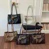 Bolso tote simple estilo coreano nuevo para otoño 2026, moderno y versátil, con una sensación de alta calidad, adecuado para ir al trabajo y se puede llevar debajo del brazo