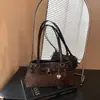 Bolso cruzado de diseño nicho, estilo casual coreano para mujer, nueva colección otoño 2026, bolso de hombro estilo baguette moderno y versátil