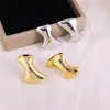 Pendientes Irregulares Geométricos de Moda Europea y Americana con Galvanoplastia de Oro Real Pendientes de Lujo Ligero de Nicho Pendientes de Venta Caliente Transfronteriza