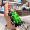 Llavero de coche modelo de carreras de aleación de dibujos animados creativo, colgante para mochila escolar de estudiante, pequeño regalo, colgante para pareja al por mayor