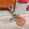 Estilo Europeo y Americano Transfronterizo Literario Retro Unisex Aleación Cuero Llavero Cuero Genuino Pequeño Regalo