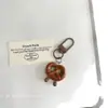 Llavero Colgante de Pan Alcalino Simulado Juguete de Comida de Resina Croissant Bagel Pan Francés Adorno Accesorio de Regalo