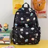 Mochila Milk-Huhu com Estampa de Desenho Animado Fresca e Fofa, Divertida e Animada, Adequada para Viagens de Estudo e Passeios de Alunos do Ensino Fundamental