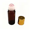 En Stock Mayoreo Engrosado Estilo Puerta de Hierro Botella de Vidrio Roller para Aceite Esencial 50ml Roller Transparente Botella de Vidrio para Aceite Esencial Mayoreo