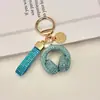 Llavero de Audífonos con Pedrería de Cristal Llavero Musical Completamente Cubierto de Pedrería Adorno Colgante de Cuerda de Diamante para Bolso Accesorios Llavero de Coche