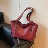 Bolsa tote externa única de grande capacidade feminina 2024 nova bolsa de ombro retrô de alta qualidade, bolsa de viagem simples e moderna