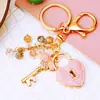Llavero de coche colección trébol de cuatro hojas con incrustaciones de diamantes, metal, lindo, charm para bolso de mujer, llavero, colgante de flor, regalo