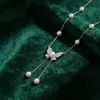 Collar Largo con Borla de Perla y Mariposa de Circonita Cúbica para Mujer, Cadena para Clavícula de Lujo Ligero de Nicho de Gama Alta, Cadena para el Cuello Elegante y Versátil