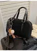 Bolso pequeño cuadrado de alta gama estilo coreano para mujer, nuevo bolso Boston tipo almohada vintage otoño 2026, bolso de hombro y bandolera