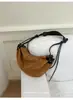 Bolso casual de gran capacidad para mujer, nuevo bolso tipo albóndiga de gamuza vintage otoño 2026, bolso de hombro y cruzado casual para el trabajo