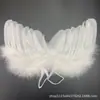 Accesorios para fotos de bebé alas de ángel de plumas mascota muñeca Paige decoración accesorios para fotos de bebé fábrica al por mayor