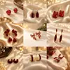 Aretes Geométricos Rojos Ankela Festivos de Año Nuevo Nicho Temperamento Venta Caliente Aretes de Botón Otoño/Invierno 2026 Venta al por Mayor de Pendientes