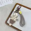 Estilo Coreano Nuevo Tela Rellena de Algodón Gato y Conejo de Dibujos Animados Llavero Delantal de Moda Conejo Broche Colgante Accesorio Versátil para Bolso