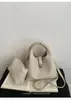 Bolso de mano simple con textura de lichi para mujer 2025 nuevo de invierno versátil bolso cubo de cuero suave bolso cruzado de alta gama