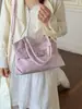 Bolsa de motocicleta coreana de nicho para mujer, nueva y moderna de moda 2026, bolso tote dulce y genial, bolso de mano de gran capacidad para el trabajo