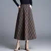 Nueva Falda de Cuadros Versátil para Mujer Otoño 2026, Moderna y Elegante, Sencilla para el Trabajo, Adelgazante, Larga, Línea A, Tendencia