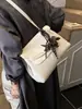 Bolsa Retro de Moda Transfronteiriça para Mulheres Inverno 2026 Nova Bolsa Versátil de Ombro Transversal Bolsa Tote de Alto Valor para o Dia a Dia
