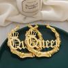 Europa y Estados Unidos pendientes calientes transfronterizos moda personalidad corona de reina pendientes huecos de bambú pendientes venta directa de fábrica