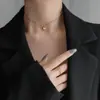 Collar de titanio con cuentas de letras LUCKY, moderno, simple y sofisticado para mujer, juego de cadena para clavícula de nicho de lujo ligero