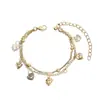 Comercio exterior transfronterizo Accesorios para pies europeos y americanos, regalo de moda para mujer, tobillera de estilo festivo para estudiante, doble capa de oro rosa, flor de rosa