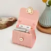 2023 Nuevo bolso mini de gelatina portátil con cierre de corazón en relieve de diamante bolso pequeño casual boca sobre rojo
