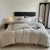 Nuevo juego de cuatro piezas de jacquard texturizado suave y amigable con la piel, juego de cama de tres piezas de color sólido para dormitorio de estudiante, disponible para venta al por mayor y dropshipping