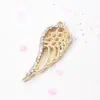 Nuevas joyas de moda accesorios DIY alas de ángel baño de diamantes accesorios colgantes individuales accesorios accesorios al por mayor comercio exterior