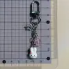Cordão CCD de trevo de quatro folhas feito à mão corrente de telefone de coelho com contas DIY girly ins corrente de pingente simples com sino